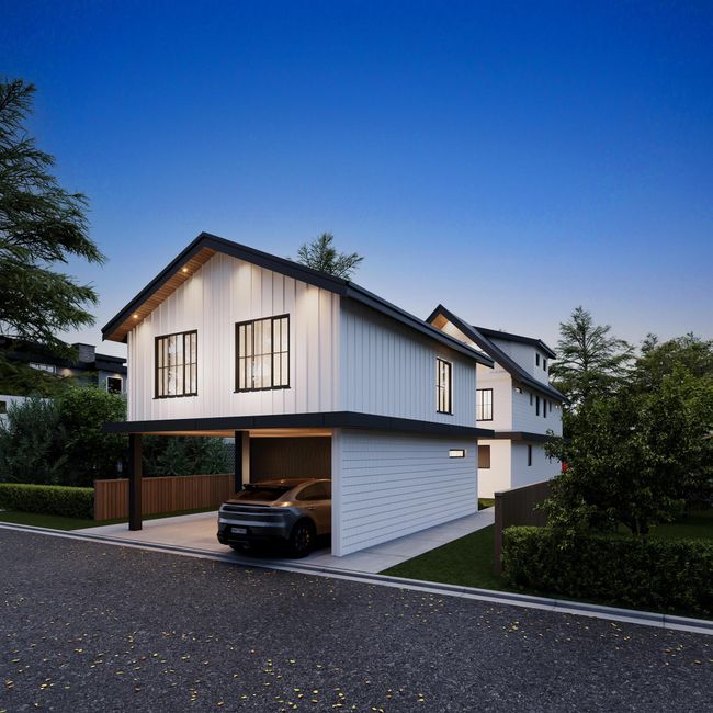 View of property exterior featuring board and batten siding and a carport | Image 6