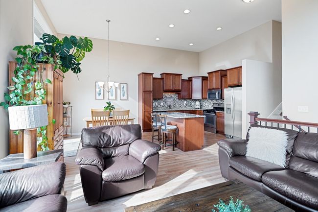 Living space is separate from upstairs bedrooms! | Image 13