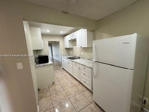 13-1663 Nw 56th Ter, Lauderhill, FL, 33313-5467 | Card Image
