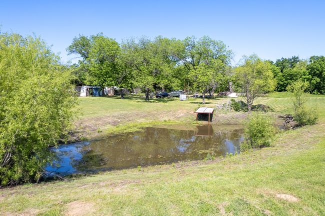 View of yard with a water view | Image 20