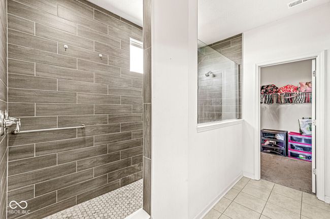 Primary suite. Shower has 2 shower heads | Image 27