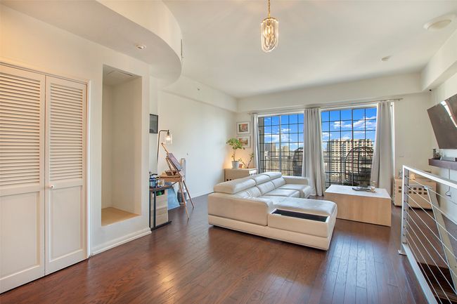 Living area featuring dark wood-style floors | Image 9