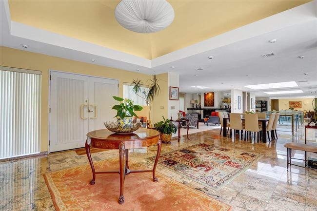 Dining space with visible vents and a skylight | Image 6