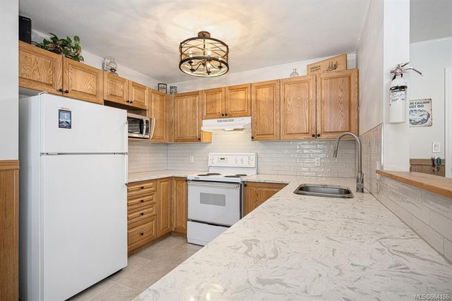 313 - 1320 Henry Rd, Condo with 3 bedrooms, 2 bathrooms and 1 parking in Courtenay BC | Image 10
