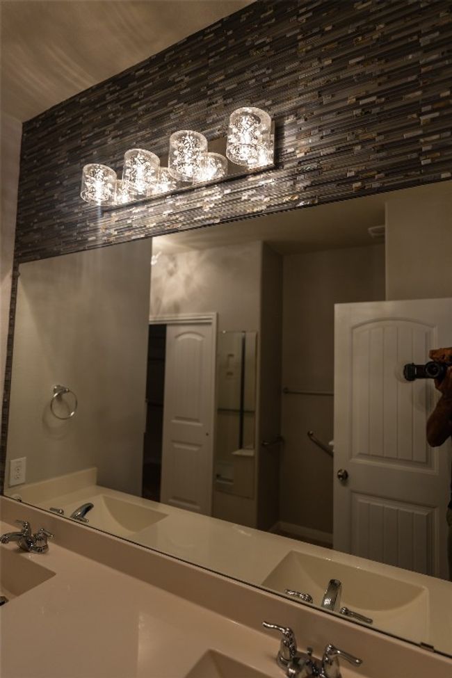 Bathroom featuring vanity | Image 9
