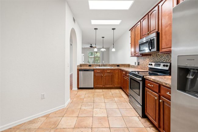 104 - 1936 Heron Cove Dr, Condo with 2 bedrooms, 2 bathrooms and null parking in Lutz FL | Image 9