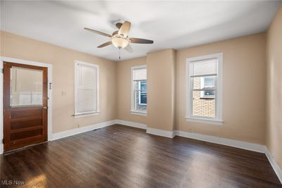 Foyer featuring ceiling fan and dark hardwood / wood-style flooring | Image 3