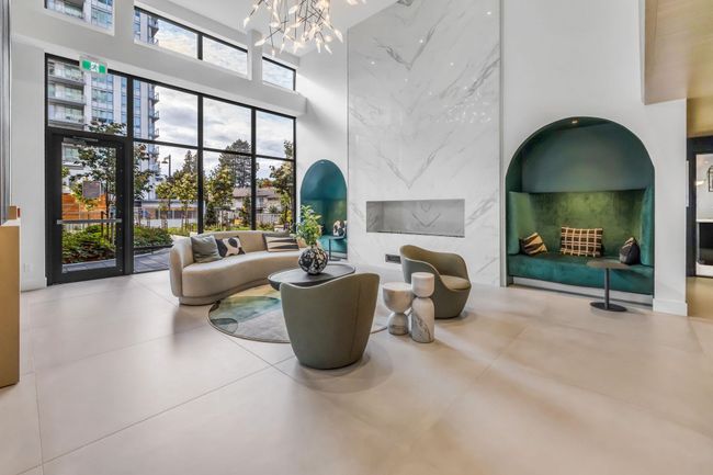 Lobby with a towering ceiling | Image 17