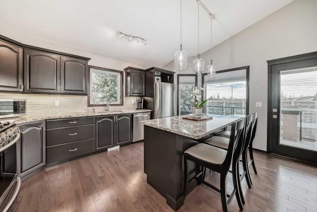 56 Mc Kenzie Lake Crescent Se, Home with 5 bedrooms, 3 bathrooms and 8 parking in Calgary AB | Image 10