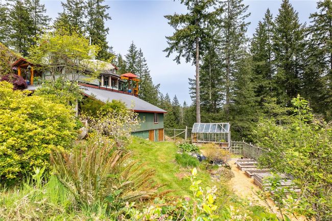 Green house with irrigation and raised garden beds | Image 76