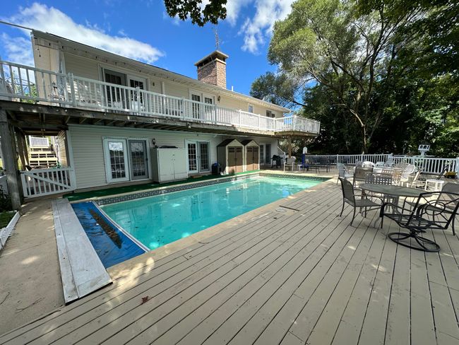 Pool and deck area. Pool is heated by solar panels on roof | Image 36