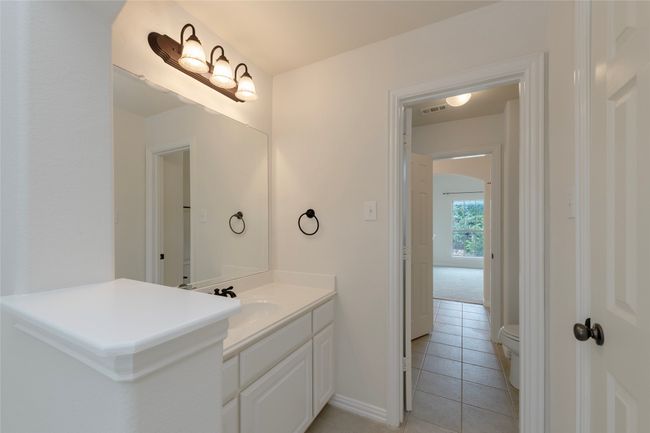 Bathroom featuring vanity and tile patterned floors | Image 29