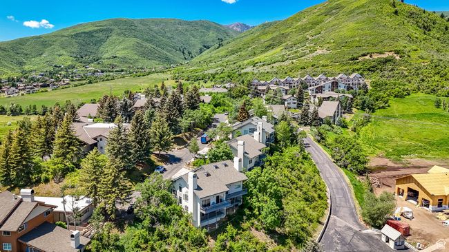 Aerial view of residential area with a mountain backdrop | Image 29
