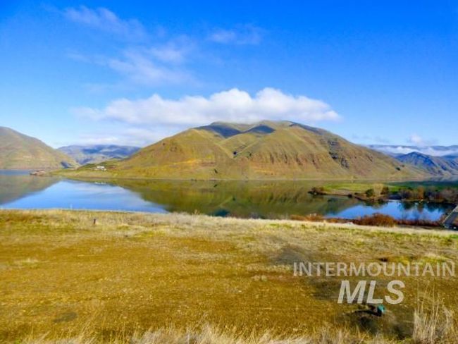 Mountain view featuring a nearby body of water | Image 35