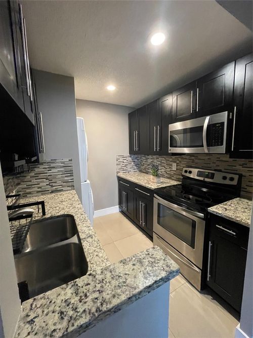 10092 Twin Lakes Dr, Coral Springs, FL, 33071-5349 | Card Image