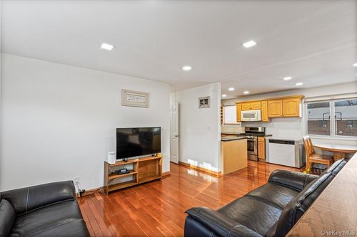 upper-218 73rd Avenue, New York, NY, 11364 | Card Image