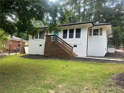 1303 Rocksprings Street, House other with 3 bedrooms, 2 bathrooms and 2 parking in Forest Park GA | Image 1