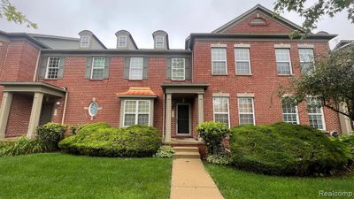 1980 Paddock Lane, Condo with 2 bedrooms, 3 bathrooms and null parking in Canton Twp MI | Image 1