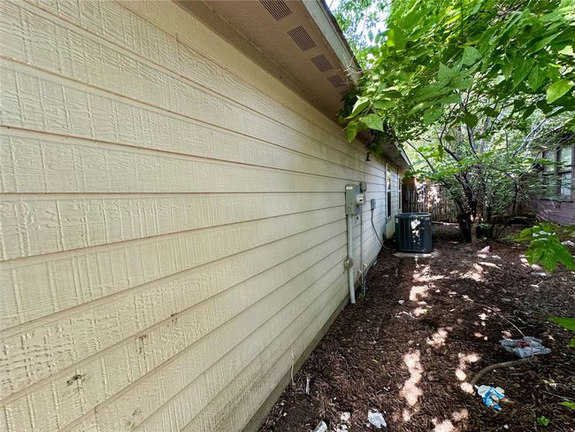 View of side of property featuring a central air condition unit | Image 5