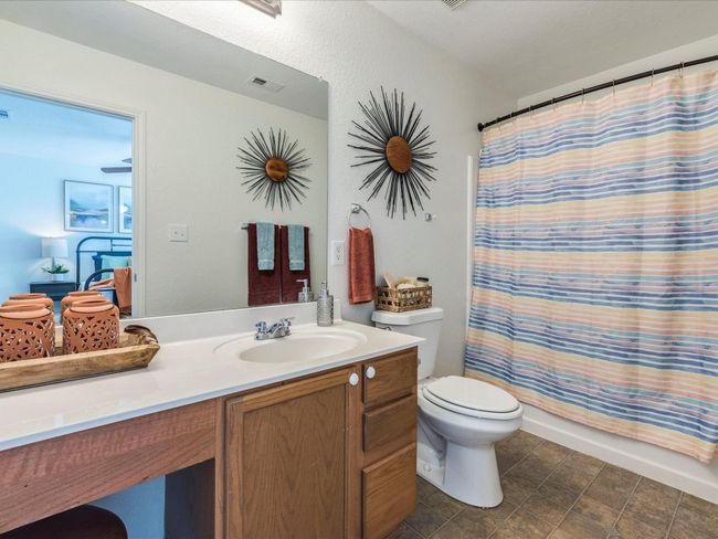 Enjoy your own private ensuite bathroom with a spacious single vanity and a shower/tub combo. | Image 17