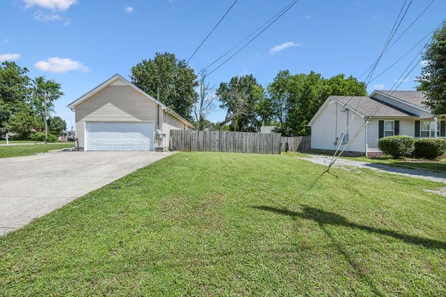Large, corner lot with an extra long concrete drive for additional parking when you have guests over + the garage has 2 220V outlets for electric vehicles! 2095 Bolden Drive, Murfreesboro, TN 37127 | Image 4