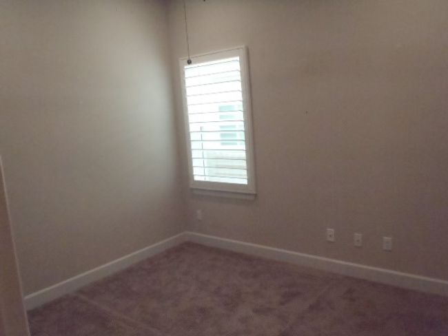 Carpeted empty room with baseboards | Image 34