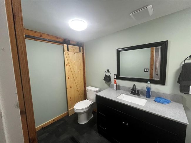 Unfurnished room with baseboards and wood finished floors | Image 5