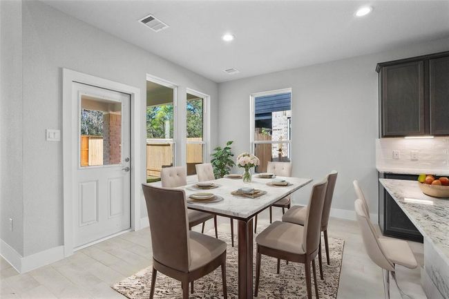 This photo is for illustrative purposes only and is not to be considered an exact replica of the finished home. Rendering does not match the finished product in terms of features, colors, landscaping, etc. Pricing, specifications, square footage and materials are subject to change at any time and without notice. | Image 5