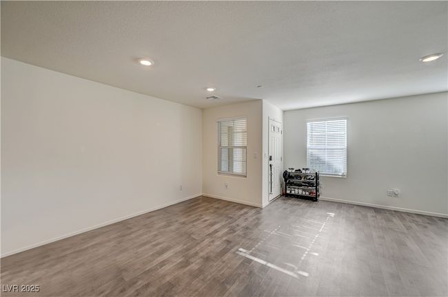 Unfurnished room featuring wood finished floors and recessed lighting | Image 6