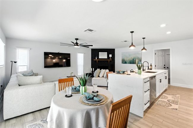 Light-filled dining area just off the kitchen with backyard views and room to gather. | Image 17