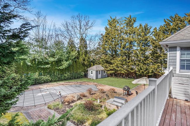 Primary balcony overlooking private backyard oasis | Image 20