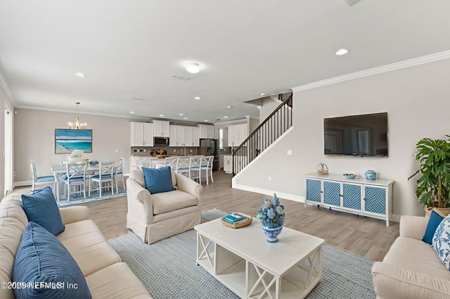 Virtually staged living room downstairs | Image 17