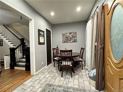 Dining room with light hardwood / wood-style floors | Image 3