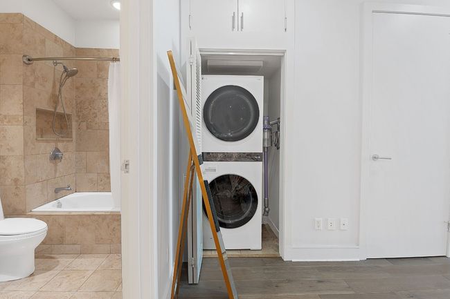 Full-size washer and dryer in laundry closet. | Image 24