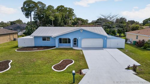 242 Se Duxbury Ave, Port St. Lucie, FL, 34983-2604 | Card Image