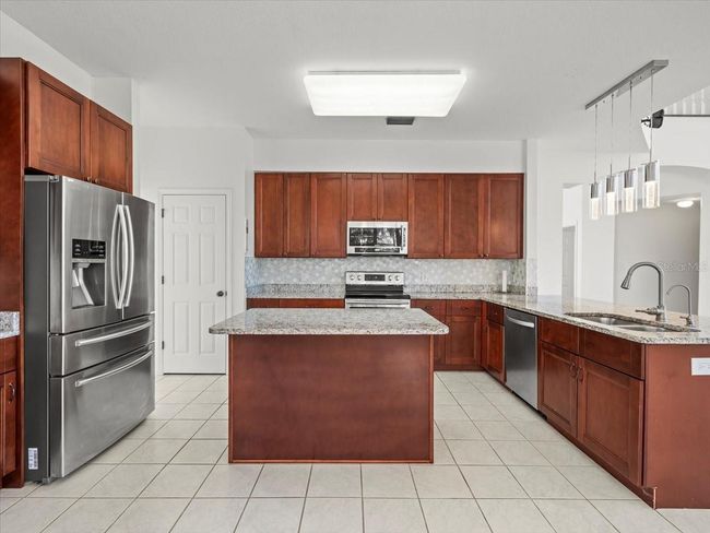 9701 Hidden Cove Ct, House other with 5 bedrooms, 3 bathrooms and null parking in Tampa FL | Image 16