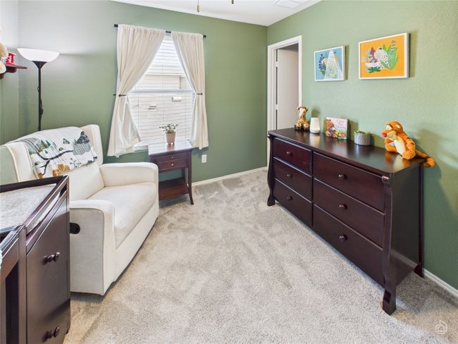 Sitting room featuring light carpet and baseboards | Image 20