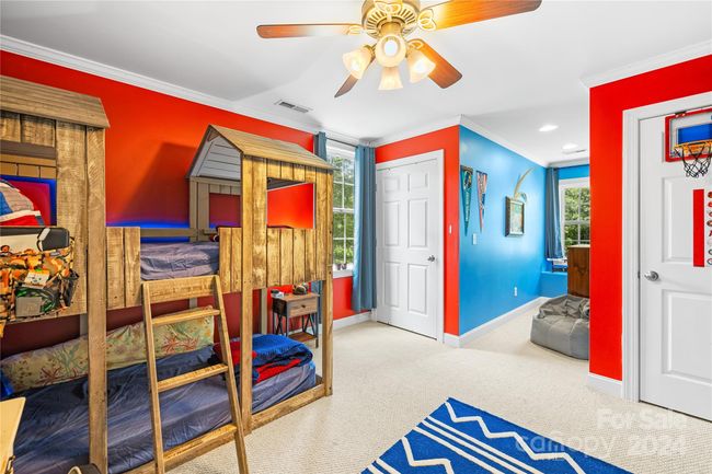 Secondary Bedroom with two closets and an ensuite full bathroom. | Image 17