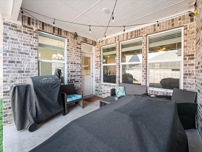 View of patio with area for grilling | Image 23