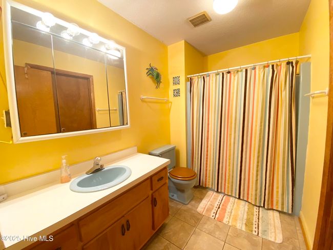 201 Ne 48 Th St, House other with 3 bedrooms, 2 bathrooms and 1 parking in Oak Island NC | Image 13
