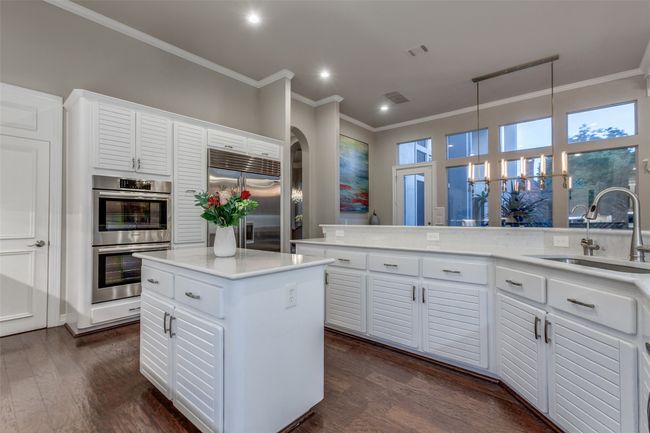 The kitchen also offers a built-in refrigerator and double ovens. All kitchen appliances have been upgraded. There is also a great walk-in pantry! | Image 16