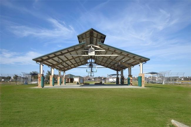 The Baseball Pavilion is surrounded by the baseball fields and has been upgraded to include 3 Pickle Ball Courts for residents to enjoy. Every year this is where the 4th of July Parade is held. The home is conveniently located to the Grand Parkway with quick access to The Woodlands, Spring and Tomball. | Image 49