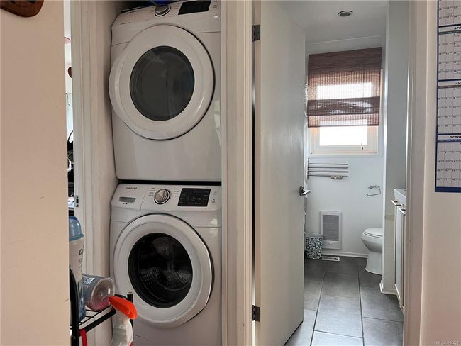 Laundry cupboard in upstairs unit | Image 14