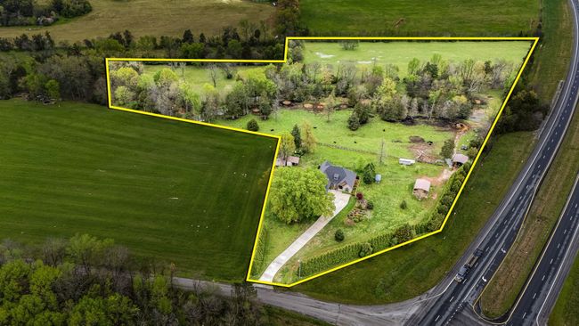 View of the property (15 +/- Acres) with a creek. | Image 7