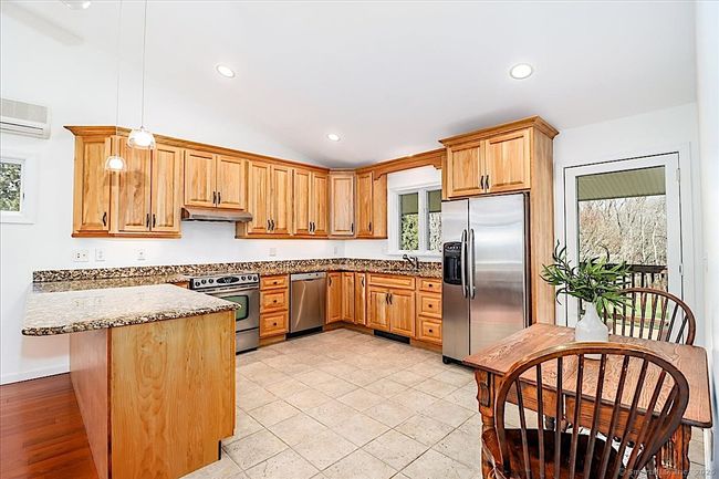 Full Eat-in Kitchen with Full Sized Appliances and Plenty of Storage | Image 20