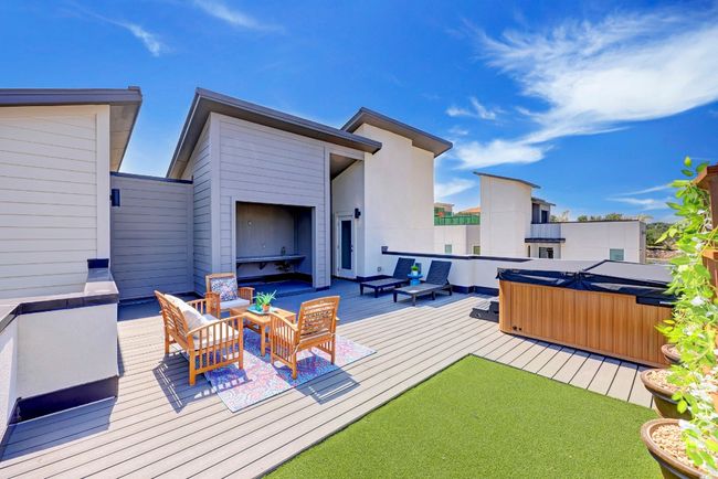 VIEW FROM #931 PRIVATE ROOFTOP PATIO. PET AREA IS INCLUDED BUT BUYER CAN CHOOSE NOT HAVE IT INSTALLED. THERE IS A HOSE SPIGOT AND DRAINS FOR CLEAING THE PET AREA. | Image 7