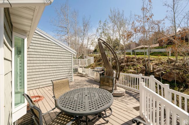 Wooden terrace featuring outdoor dining area | Image 5