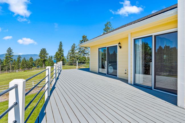 Wood deck w/ metal pipe railing | Image 39