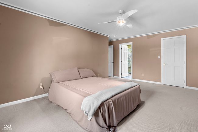 Large primary bedroom with attached bath and walk-in closet | Image 24