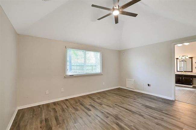 Large primary bedroom with high ceilings | Image 7